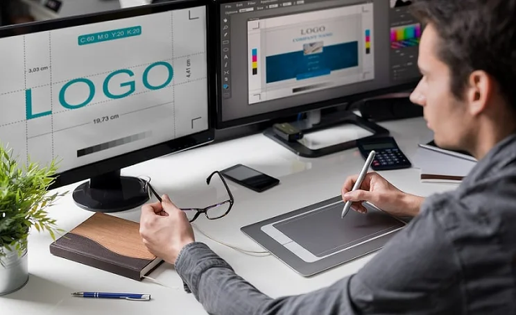 Designer creating a company logo