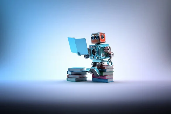 small robot reading a manual