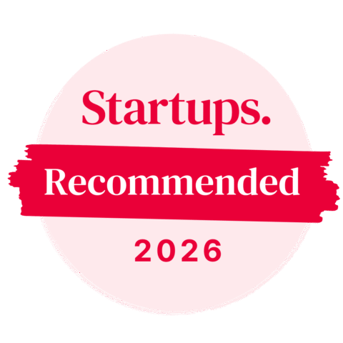 The Startups "Recommended" award is a pink circle with a brushstroke in the center displaying the words "Recommended", with the Startups logo on top, and the year 2026 at the bottom.