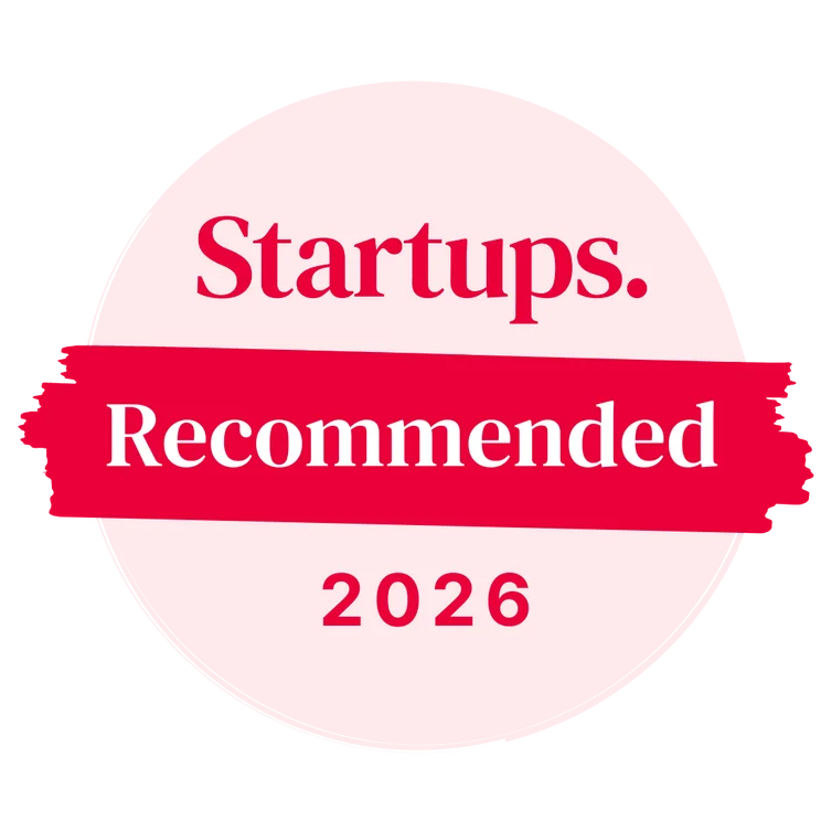 The Startups "Recommended" award is a pink circle with a brushstroke in the center displaying the words "Recommended", with the Startups logo on top, and the year 2026 at the bottom.