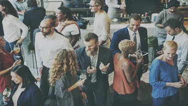 A crowd of people networking shot from above