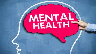 Graphic of a chalkboard with a person's head and a brain with mental health written on it