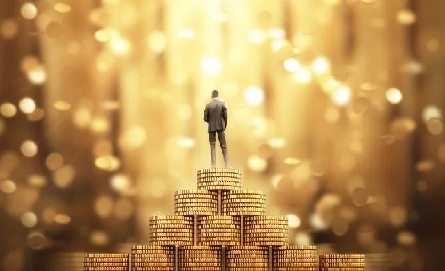 Man-standing-on-money-rich