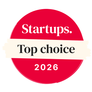 The Startups "Top choice" award is a red circle with a yellow brushstroke in the center displaying the words "Top choice", with the Startups logo on top, and the year 2026 at the bottom.