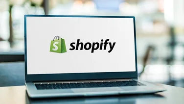 Shopify logo on laptop