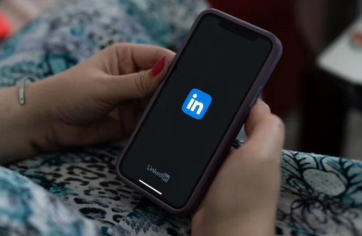 "LinkedIn" logo On a smartphone. Job search concept. March 27, 2