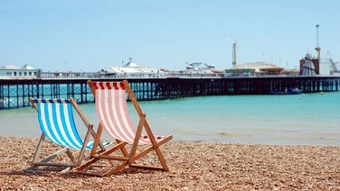 deck chairs on the beach Brigton England