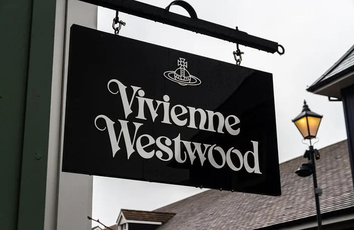 Bicester Village outlet, England , Sign or logo of Vivienne Westwood on hanging sign on April 04 2019 in UK.