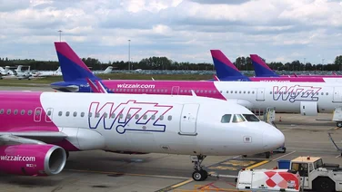 LUTON, UK - JULY 12, 2019: Wizz Air Airbus A320 fleet at London Luton Airport in the UK. It is UK's 5th busiest airport with 16.5 million annual passengers.