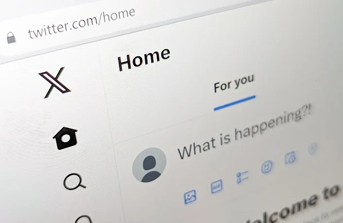 San Francisco, California - 2023: Twitter website UI is updated with new X logo after Elon Musk's rebranding in 2023, closeup page displayed on a computer screen