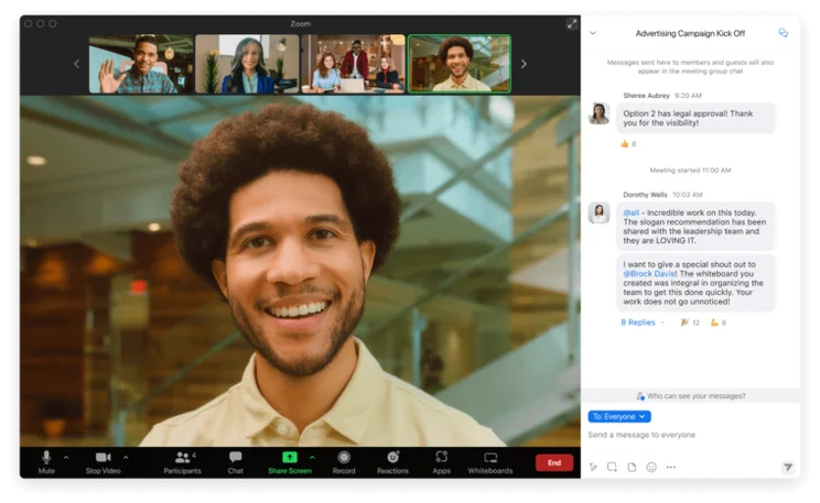 Zoom web conferencing software interface showing multiple video participants and chat messages