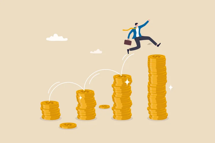 Man jumping from pile of gold coins to higher pile of gold coins