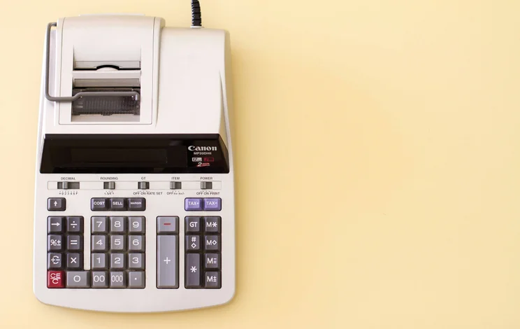 Printer on a yellow surface