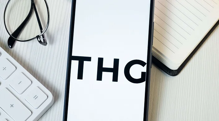 THG or The Hut Group brand logo on an iphone screen