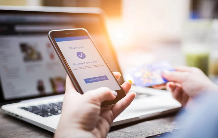 Customer making an online purchase using their smartphone