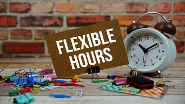 Sign reading "Flexible hours" beside a clock