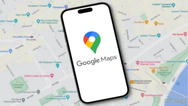 A smartphone device against a backdrop of a traditional map displaying the Google Maps logo.