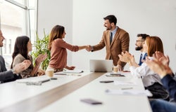 Leaders CEO bosses shaking hands boardroom office