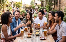 friends enjoying drinks outside