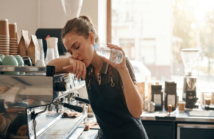 overheated cafe worker