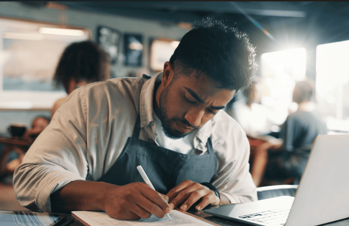 A hospitality manager doing their taxes.